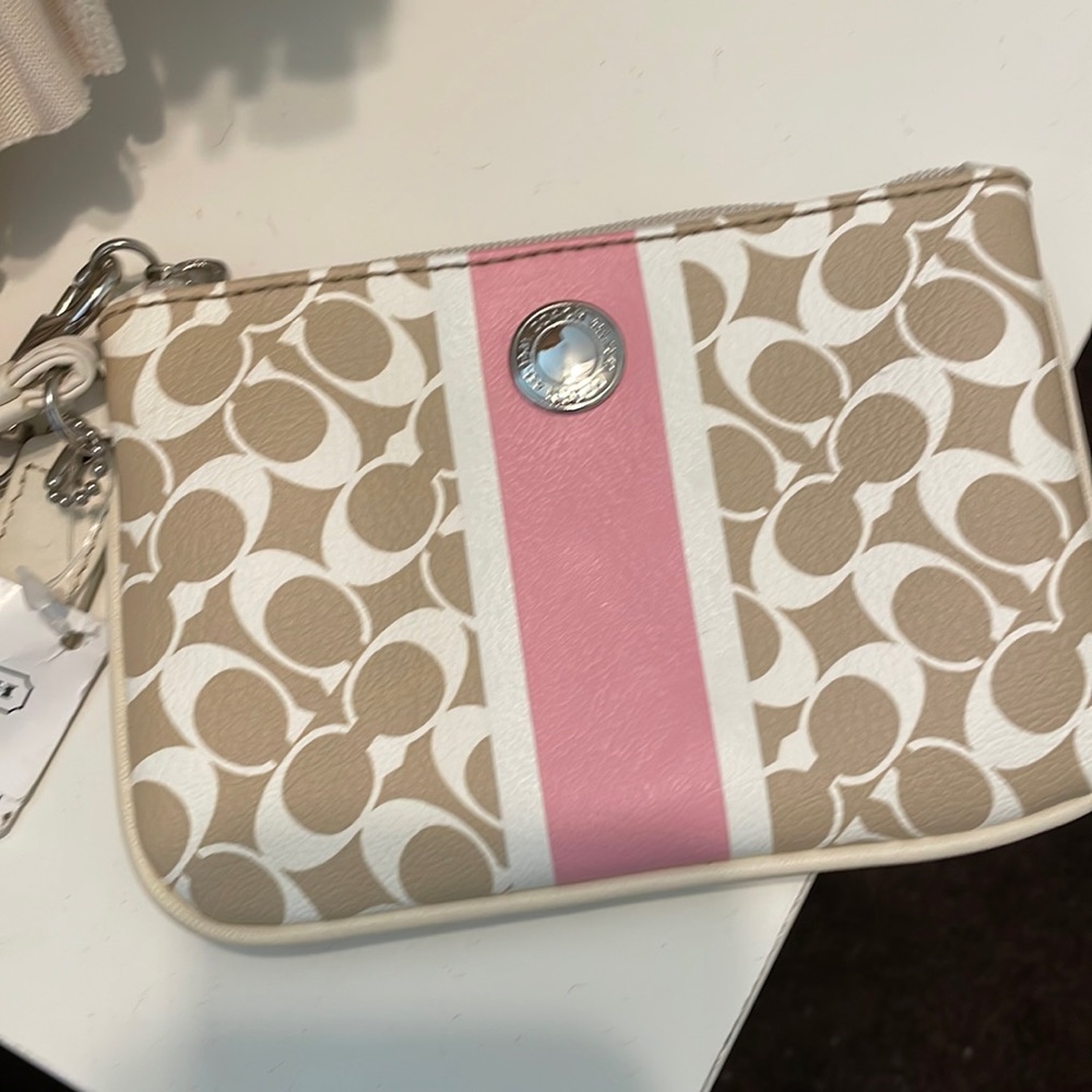 Tan and Pink Coach Wristlet